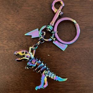 New with defect Coach Rexy Dino Oil Slick Keychain